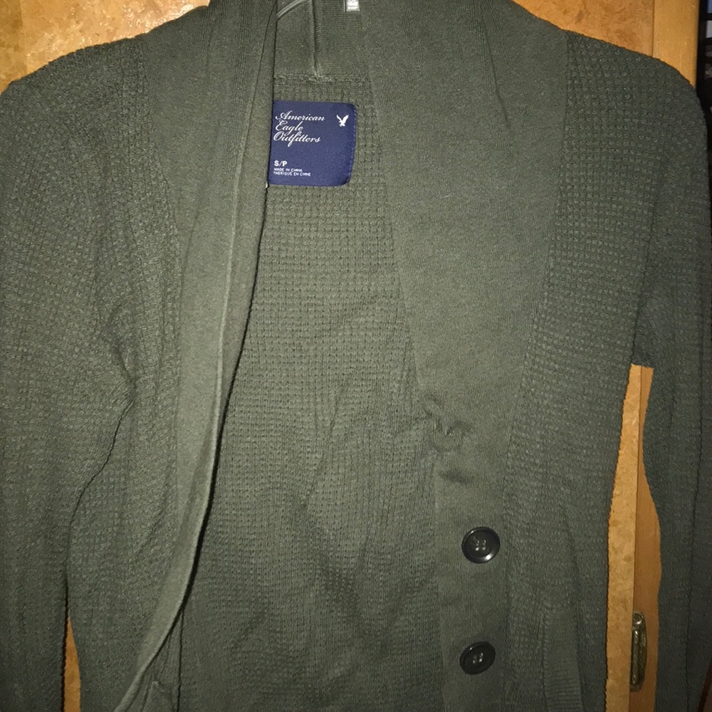 green knit button down sweater